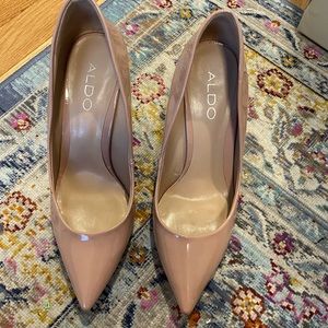 Aldo nude patent leather pumps